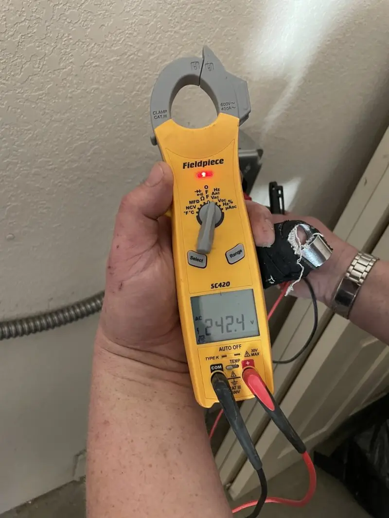 Voltage testing with clamp meter during Aluminum Wiring Replacement in Baldwin City